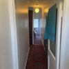 Photo 2: View from front door through to back door 