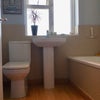 Photo 4: Bamboo floored bathroom 