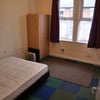 Photo 2: Furnished Bedroom / Lounge