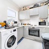 Photo 2: Kitchen area