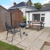 Photo 8: Patio With Seating And Bike Storage