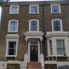 Photo 8: The building - the flat is top floor at the back.