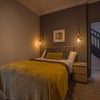 Photo 2: Bedroom 2, ground floor. Fully furnished, private en-suite, double doors directly to the garden