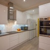 Photo 9: Large open plan kitchen, 2 fridge freezers, 2 ovens, 2 hobs