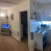 Photo 1: Open planned living room and kitchen dining room