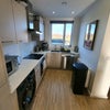 Photo 3: Kitchen with dishwasher and washing machine
