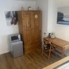 Photo 5: Wardrobe, fridge and microwave
