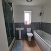 Photo 5: Bathroom and shower