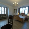Photo 2: huge arched bay windows