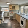 Photo 4: Communal Kitchen with Washing Machine
