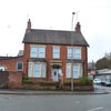 Photo 4: Front Of Property