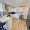 Photo 3: Bright kitchen with fitted appliances