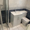 Photo 4: Downstairs toilet and shower