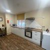 Photo 5: One of two shared kitchens