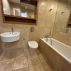 Photo 4: Guest bathroom and toilet