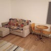 Photo 5: Bedroom has sofa and table
