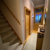 Photo 7: Hall way with shoe storage 