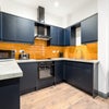 Photo 3: Top Floor Kitchen