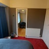 Photo 3: From bedroom looking through to storage area