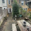 Photo 8: View of house from garden