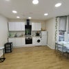 Photo 2: Kitchen and Living Room