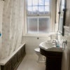 Photo 3: Large family bathroom - used by 2 single rooms only- shower, bath , sink and loo 