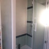 Photo 6: Walk in shower always has hot water available