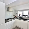 Photo 10: Communal Kitchen and Living Area
