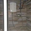 Photo 6: Electric shower over bath
