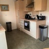 Photo 7: Kitchen with oven, hob, fridge freezer, microwave, washing machine, microwave, etc