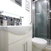Photo 13: Top floor shared bathroom