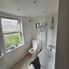 Photo 5: Bathroom with bath/shower