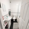 Photo 5: Shared bathroom