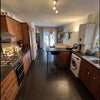 Photo 2: Kitchen with 2 fridge/freezers and dishwasher