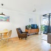 Photo 2: Living area and balcony