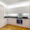 Photo 5: Kitchen with fridge-freezer, dishwasher, oven, electric hob, kettle