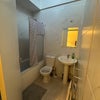Photo 4: This is the second bathroom next to the bedroom  