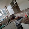 Photo 2: Shared kitchen with toaster, microwave, kettle, and oven provided.