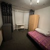 Photo 1: Bedroom. Features desk space convinient for remote work or studies.