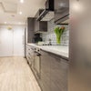 Photo 5: Large Communal Kitchen and Living Area
