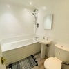 Photo 4: Upstairs toilet and bathroom