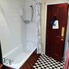 Photo 7: First floor shower/toilet
