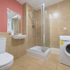 Photo 5: Downstairs bathroom 
