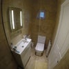Photo 5: Shower & toilet down stairs 