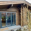 Photo 2: Front entrance with bi-fold doors