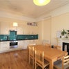 Photo 2: Kitchen side of the Shared Kitchen/Living Room