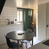 Photo 4: The kitchen dining area with dishwasher and washing machine