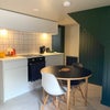 Photo 5: The kitchen with oven and hob