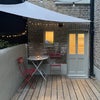 Photo 8: The decked area outside the back door
