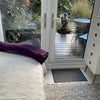 Photo 2: bed and deck area
